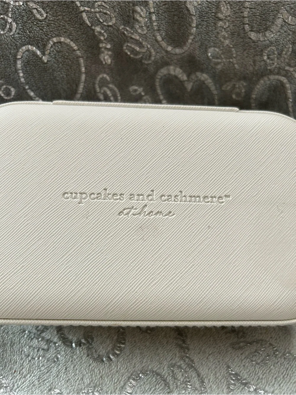 cupcakes & cashmere white wristlet